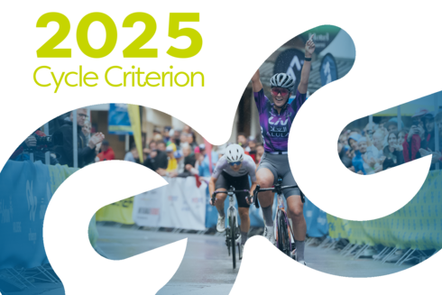 Racing cyclist cheering as she crosses the finish line in the village centre of St. Anton am Arlberg in front of a cheering audience. ‘2025 Cycle Criterion’ is written in yellow/green at the top left of the picture.