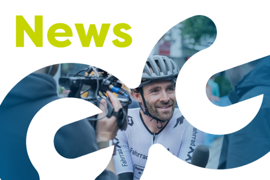 Bild in Form des Arlberg Giro Logos mit Text "News" in gelb.